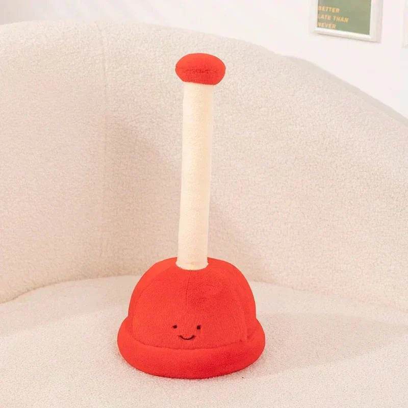 Red plunger with a smiling face on a white surface