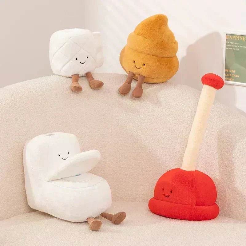 Four cute plush toys on a light-colored surface